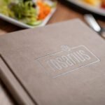 Protège-menus à pince
