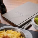 Protège-menus à pince